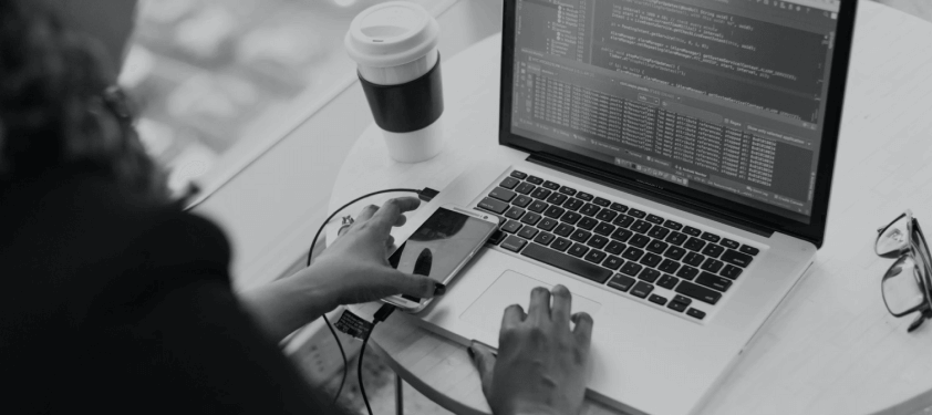 Qestit woman on computer