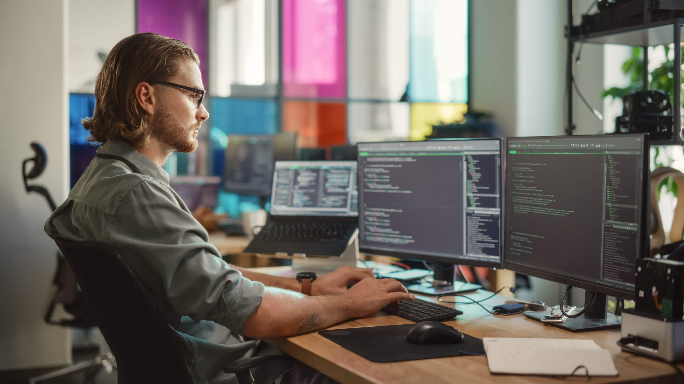 Male person working on the computer